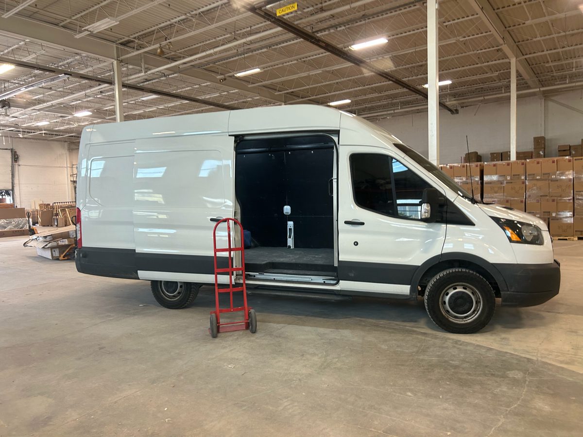 Toronto Move team handling items in a warehouse